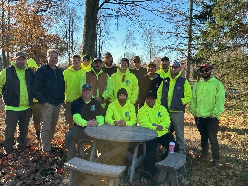 Group of staff in bright jackets outdoors