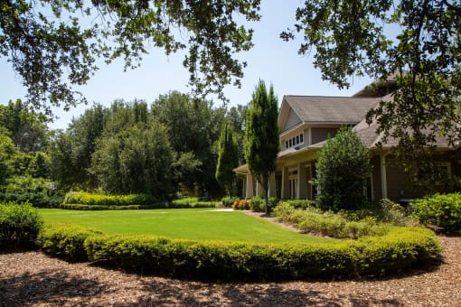 Beautiful exterior view of the facility surrounded by greenery.