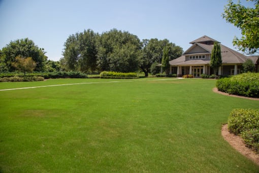 Well-maintained green lawn in front of facility
