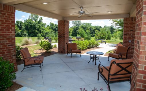 Outdoor seating area with chairs and tables