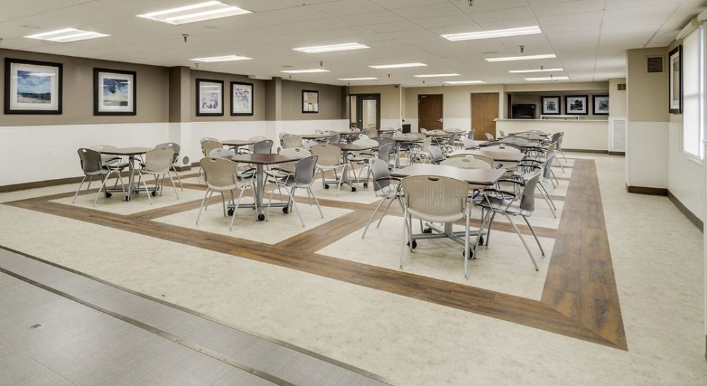 Dining area with empty tables and chairs