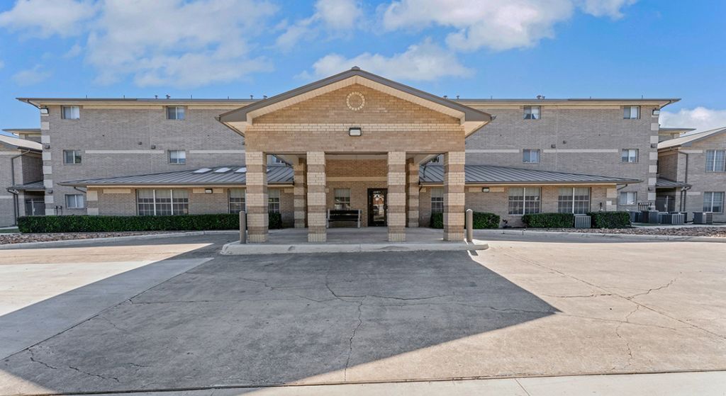 Exterior view of Center Place Senior Apartments entrance.