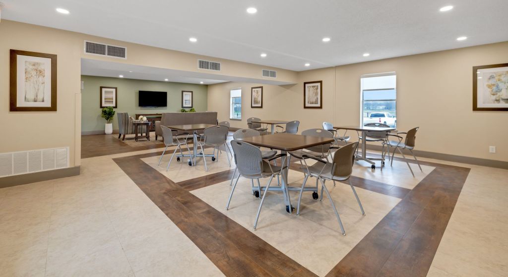 Interior common area with tables and chairs