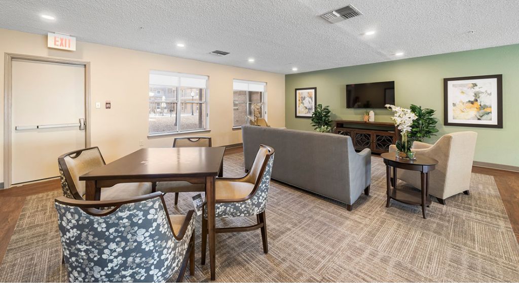 Common area with seating and TV.