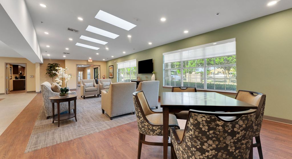 Interior common area with seating and natural light.