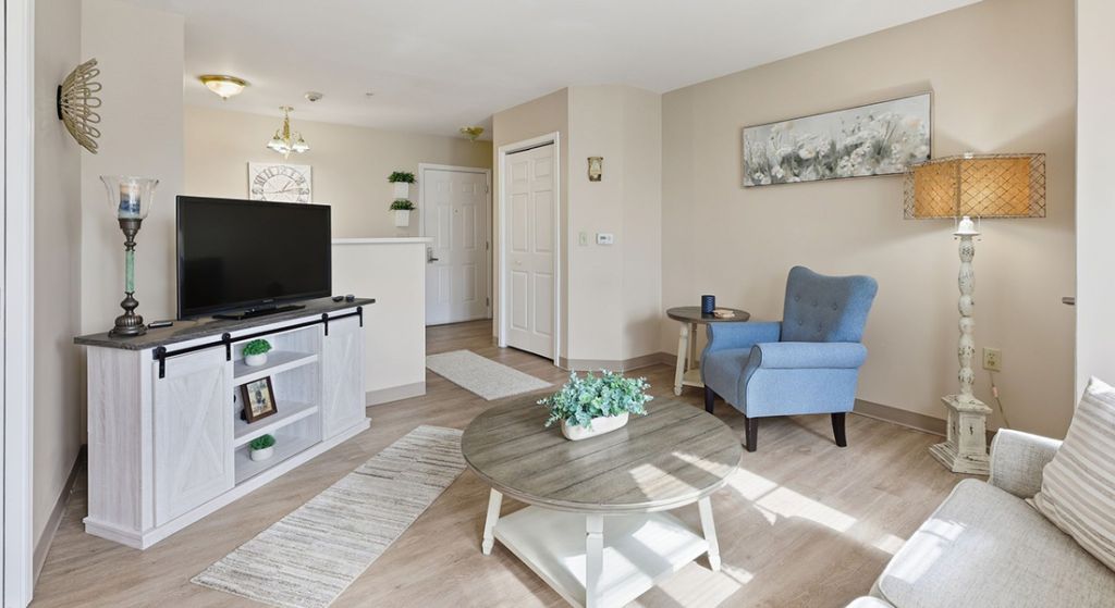 Cozy living room area with modern decor and furniture.
