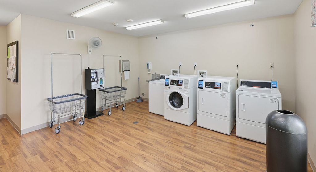 Laundry room with washers and dryers