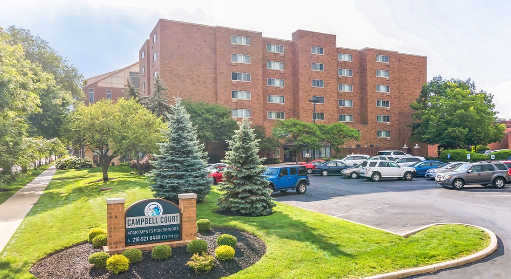 Exterior view of Campbell Court with parking area