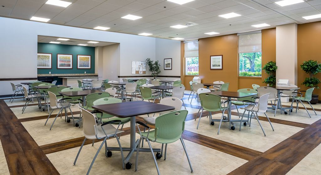 Bright dining room with tables and chairs