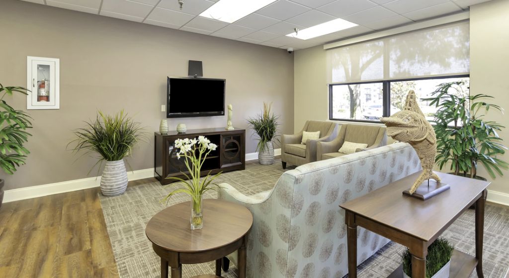 Cozy common area with seating and decor.