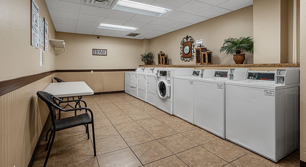 Laundry room with washers and dryers