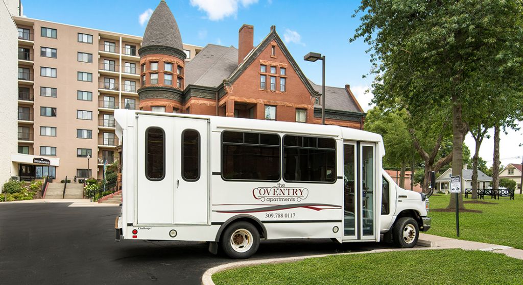 Transportation bus parked outside the facility