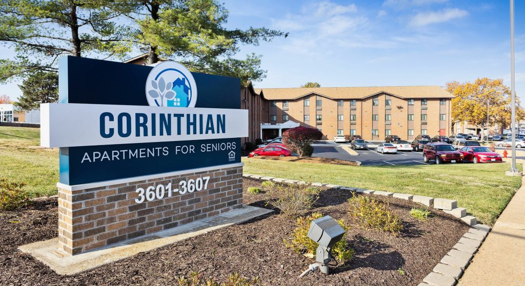 Exterior view of the Corinthian Apartments sign