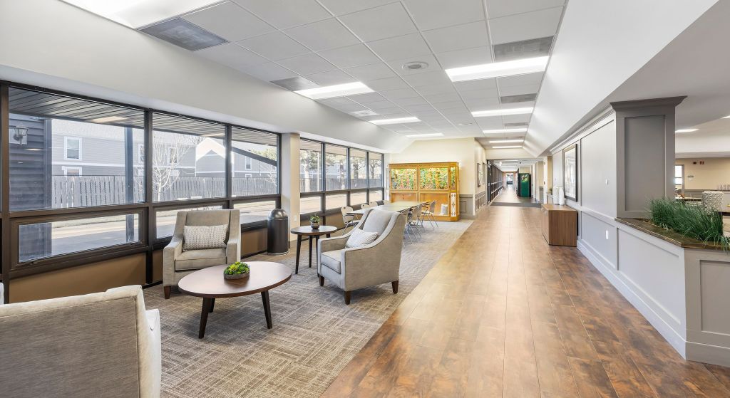 Bright common area with seating and natural light