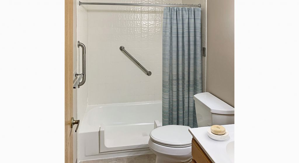 Simple bathroom with shower and curtain