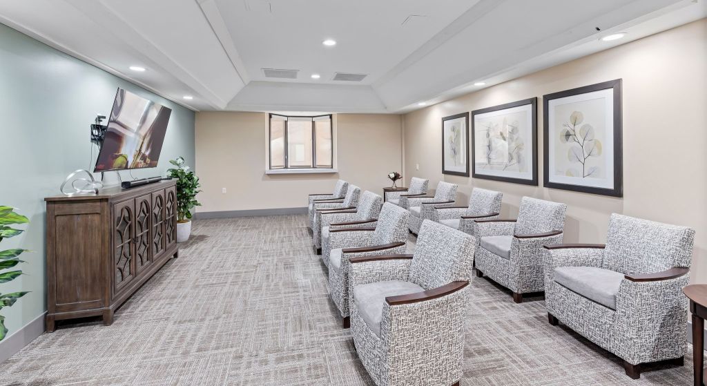 Common area with seating and TV
