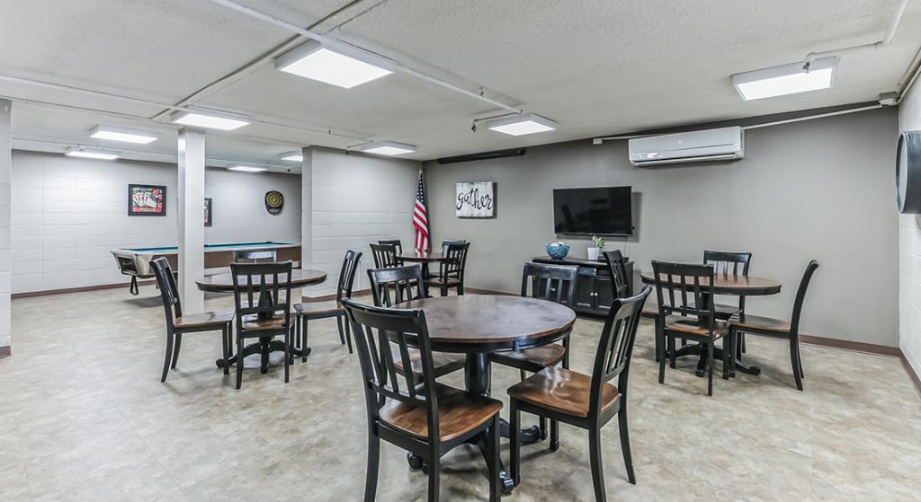 Interior common area with tables and chairs