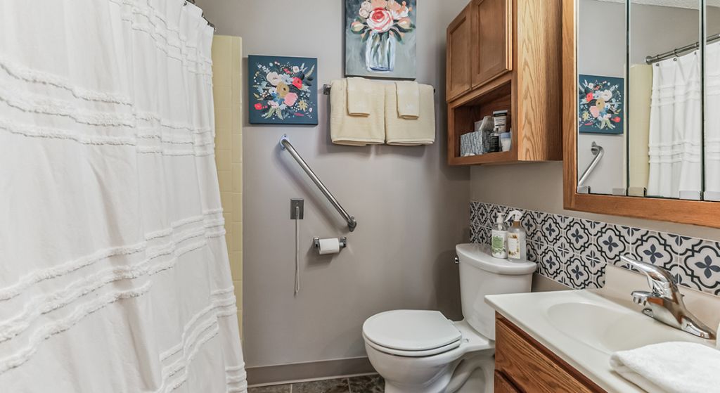 Clean bathroom with floral decor
