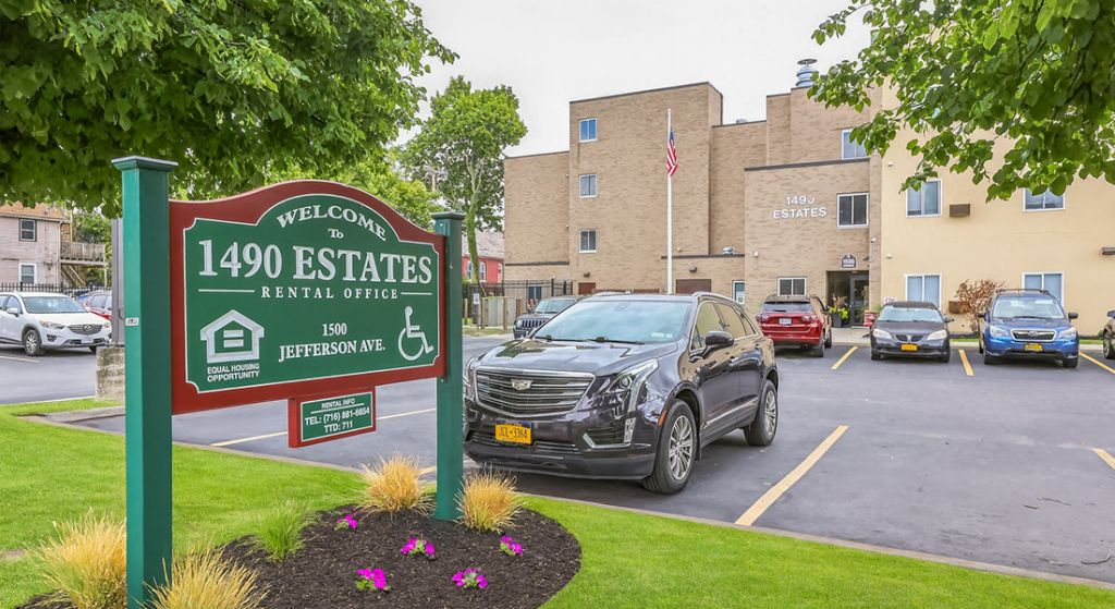 Exterior view of assisted living facility with parking