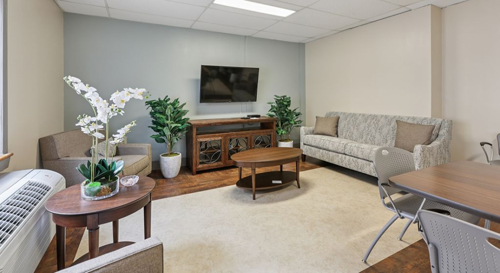 Common area with comfortable seating and decor.