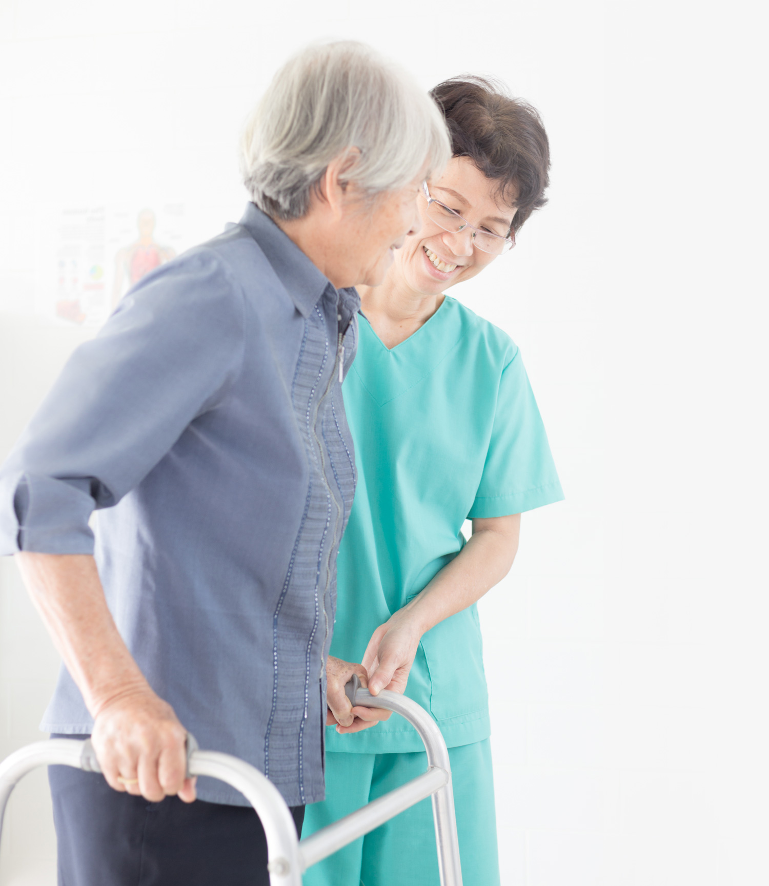 Nurse assisting elderly resident with walker