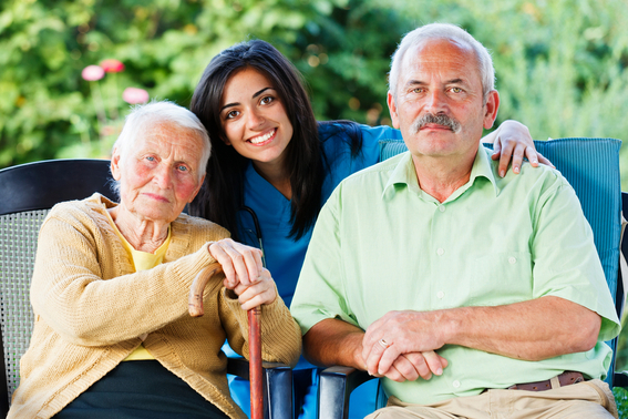 Residents and staff enjoying time outdoors together.