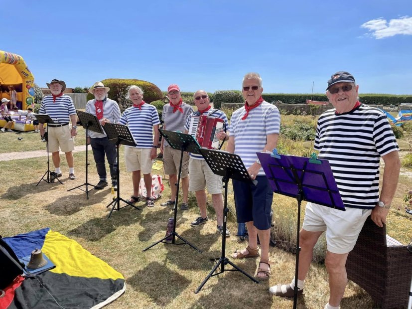 A band performing outdoors at the facility.