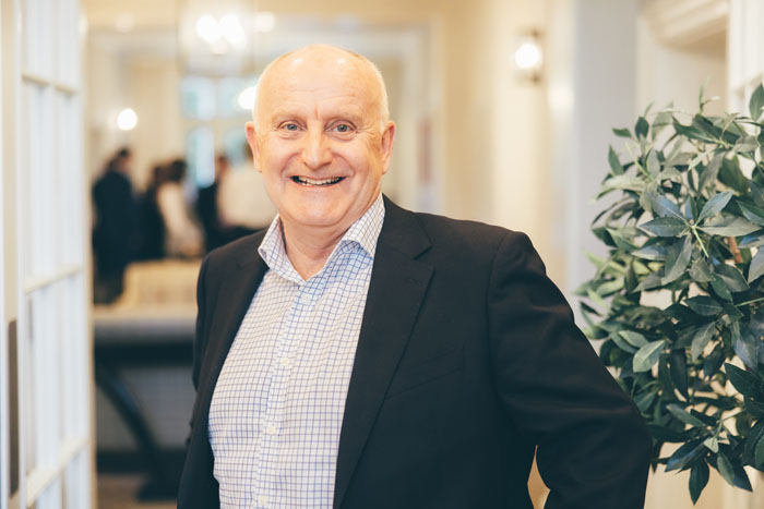 Smiling man in a care home setting