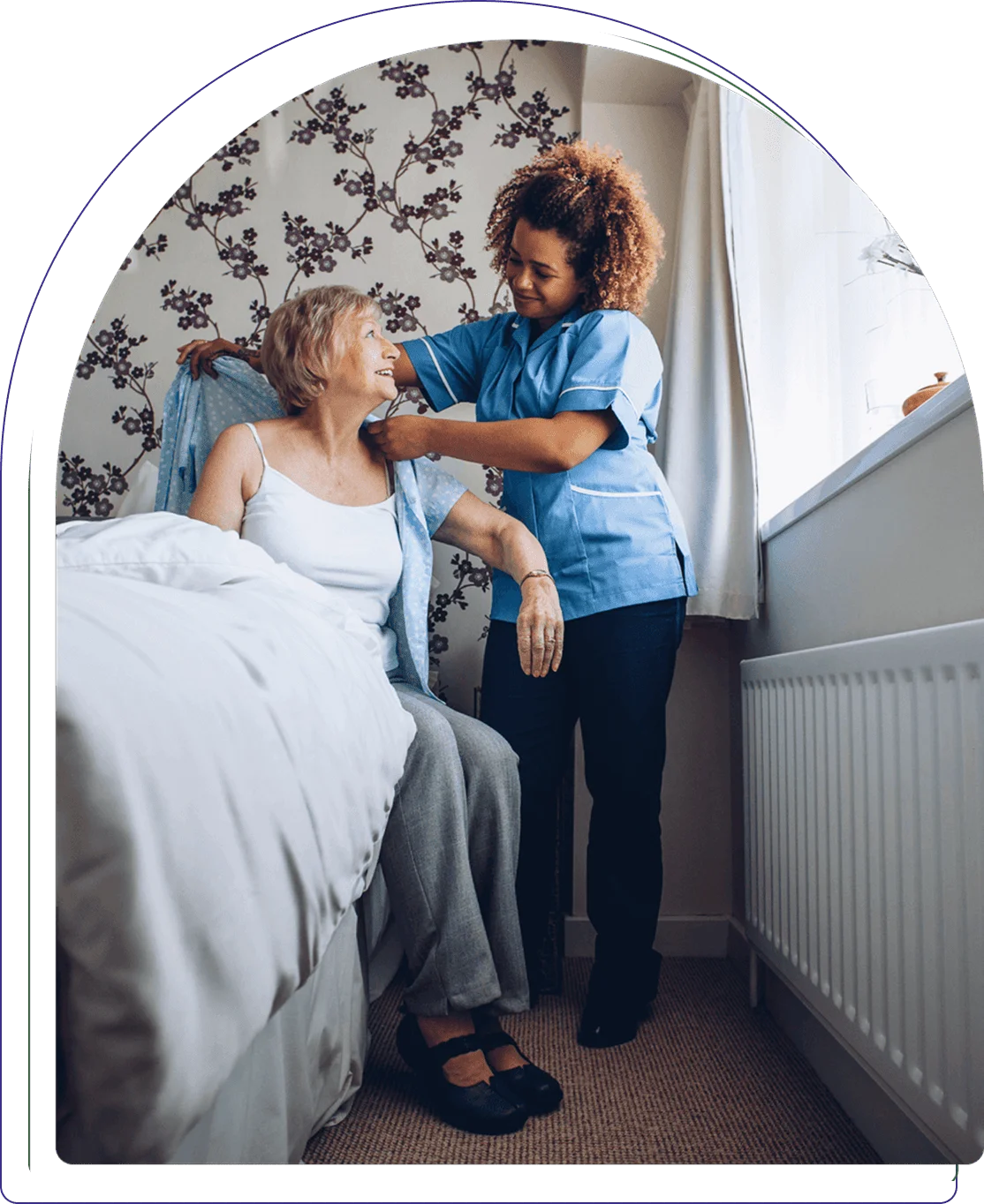 Caregiver assisting a senior woman in a room
