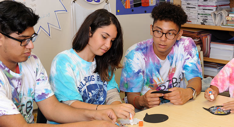 Youth engaging in a craft activity