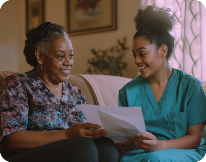 A caregiver and a resident enjoying a conversation.