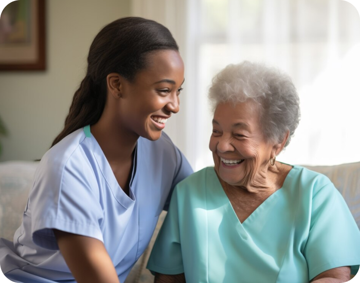 Nurse interacting joyfully with a senior resident.
