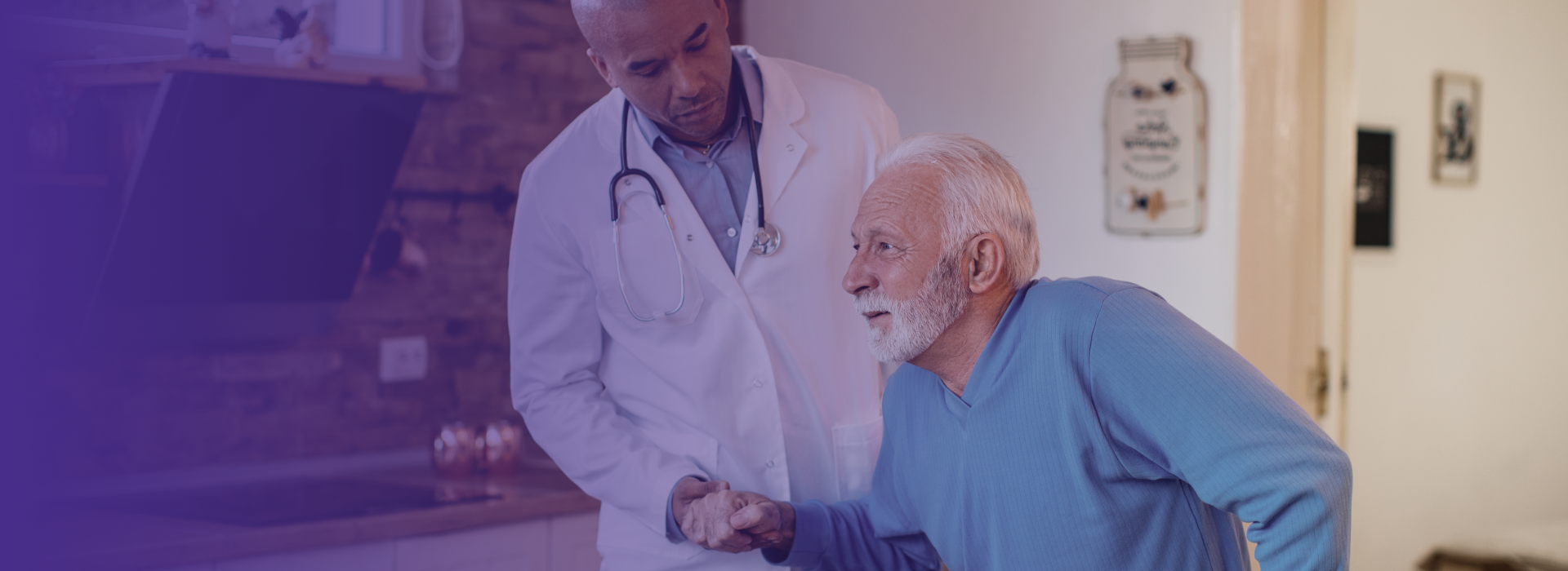 A medical professional assisting an elderly man