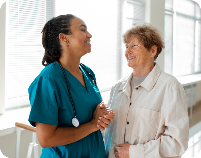 Caregiver and resident interacting joyfully