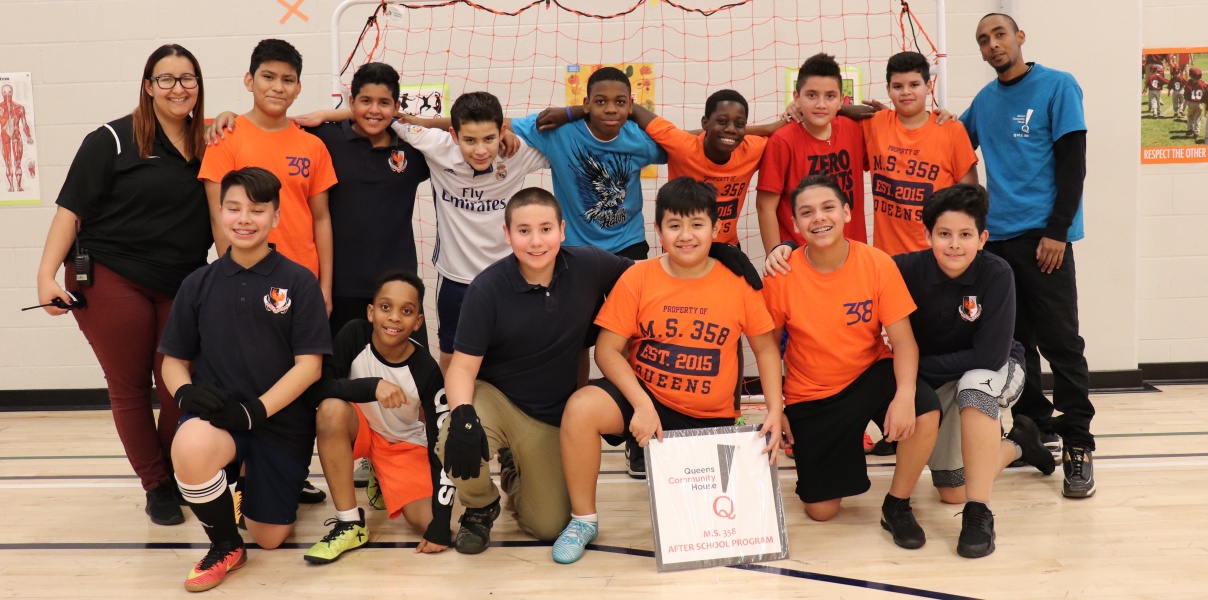 Group of children in a sports setting.