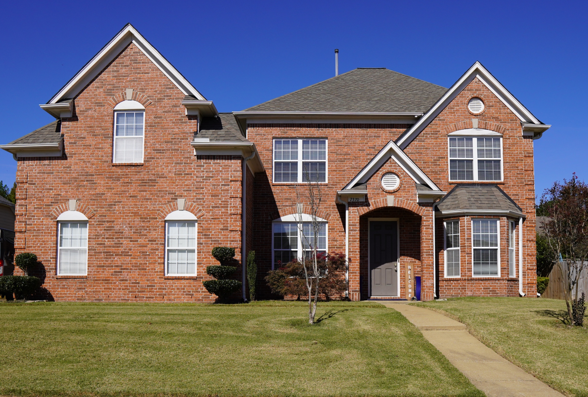 Exterior view of a brick residential building.