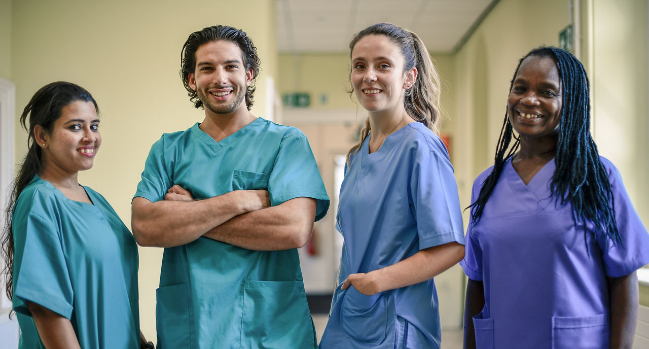 Care staff members in a hallway