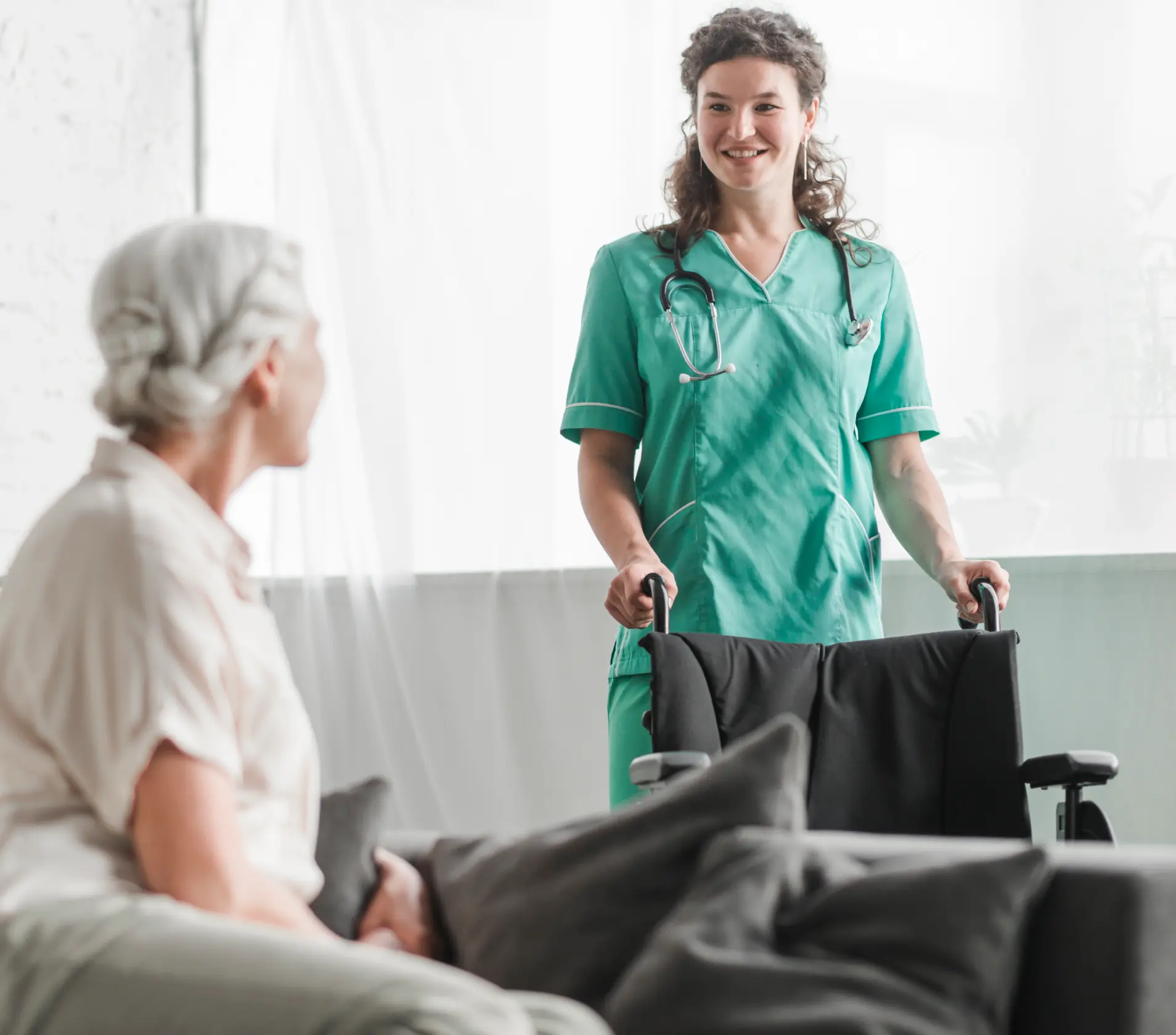 Healthcare worker assisting a resident.
