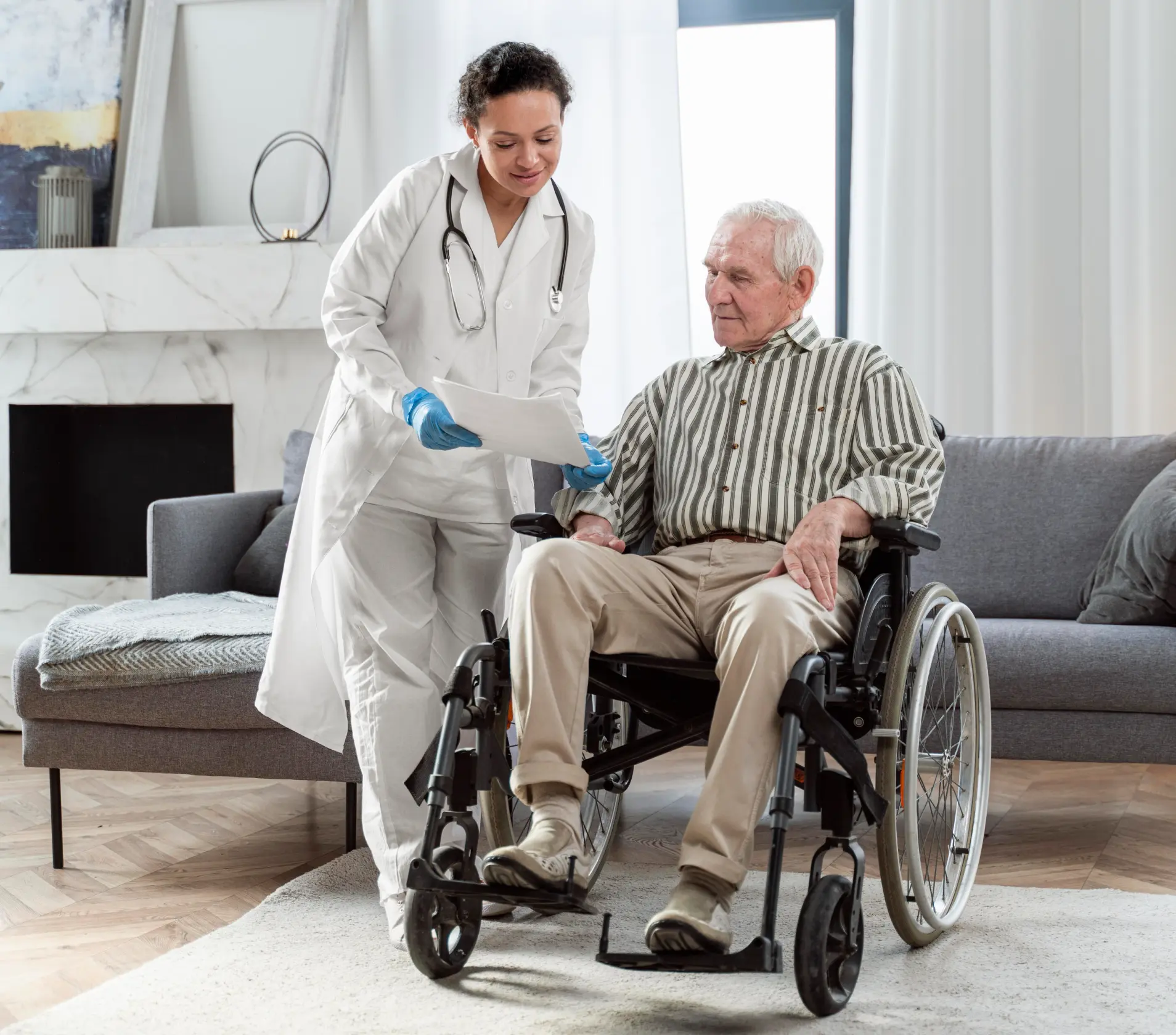 Healthcare professional assisting a senior on wheelchair