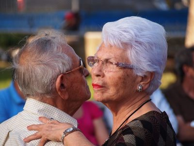 Senior couple enjoying a dance outdoors