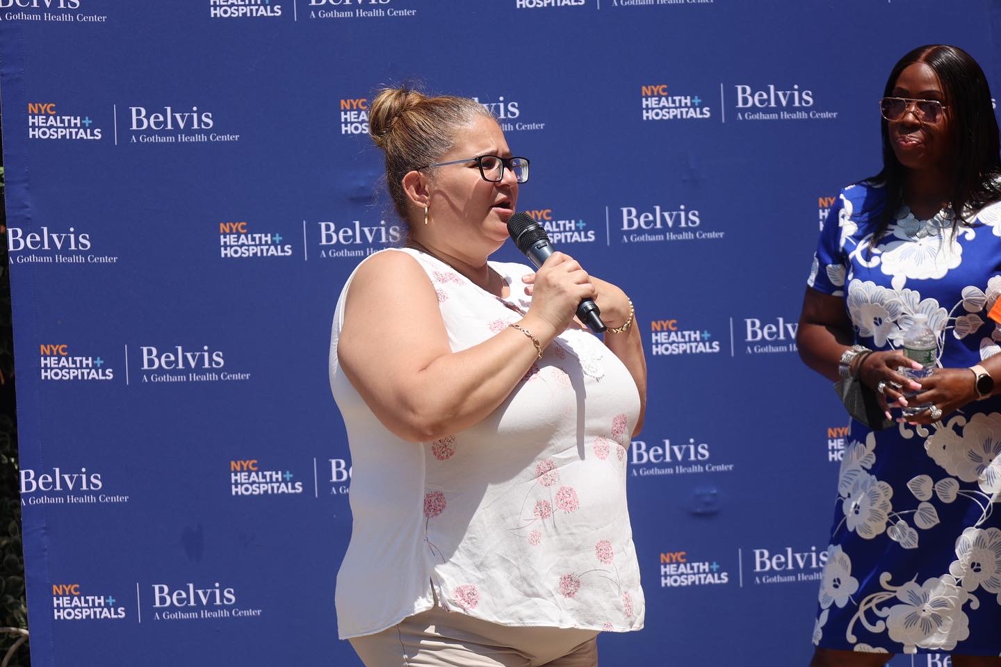 Speaker addressing an outdoor gathering event