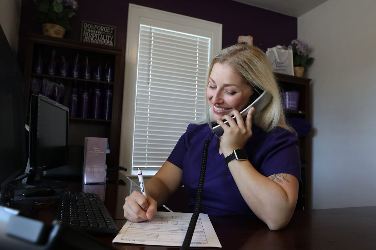 Employee at desk talking on the phone