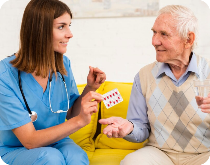 Nurse explaining medication to an elderly resident
