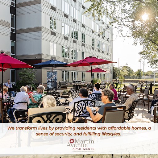 Residents socializing outdoors at the facility