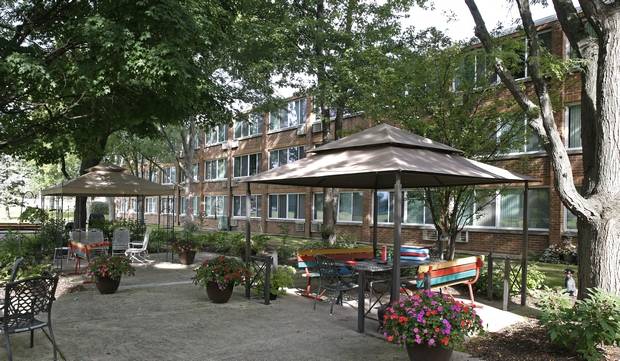 Outdoor area with seating and greenery