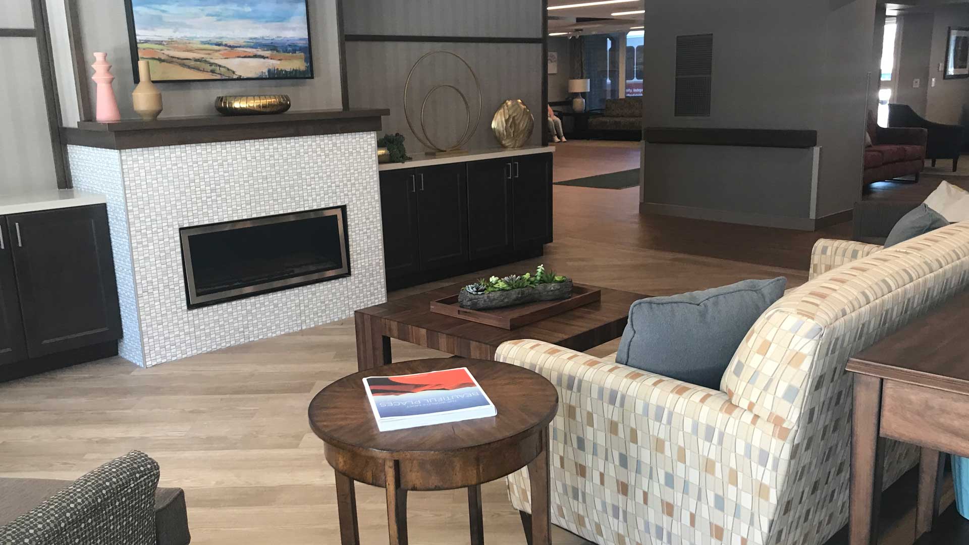 Cozy common area with seating and decorative elements.