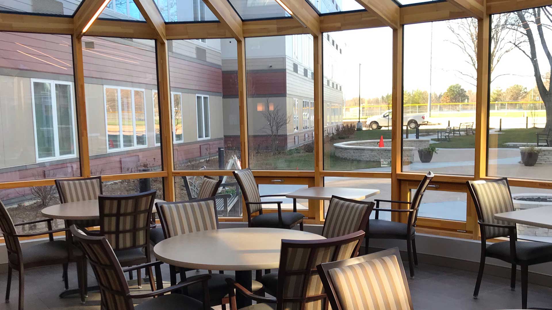 Bright common area with chairs and tables