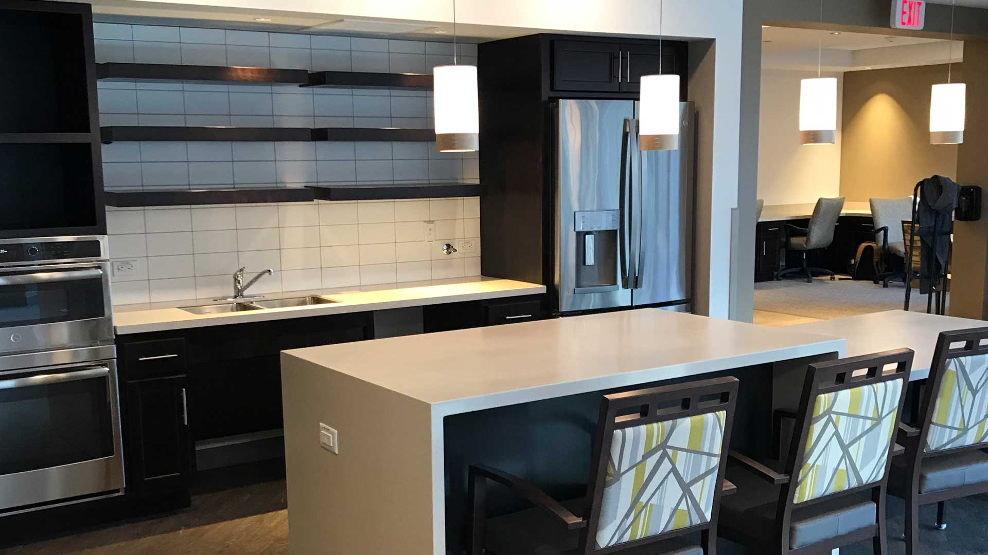 Modern kitchen and common area in the facility