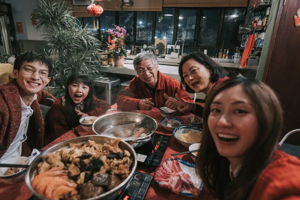 Group of diverse people enjoying a meal together