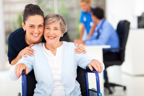 Caregiver with resident in a warm environment